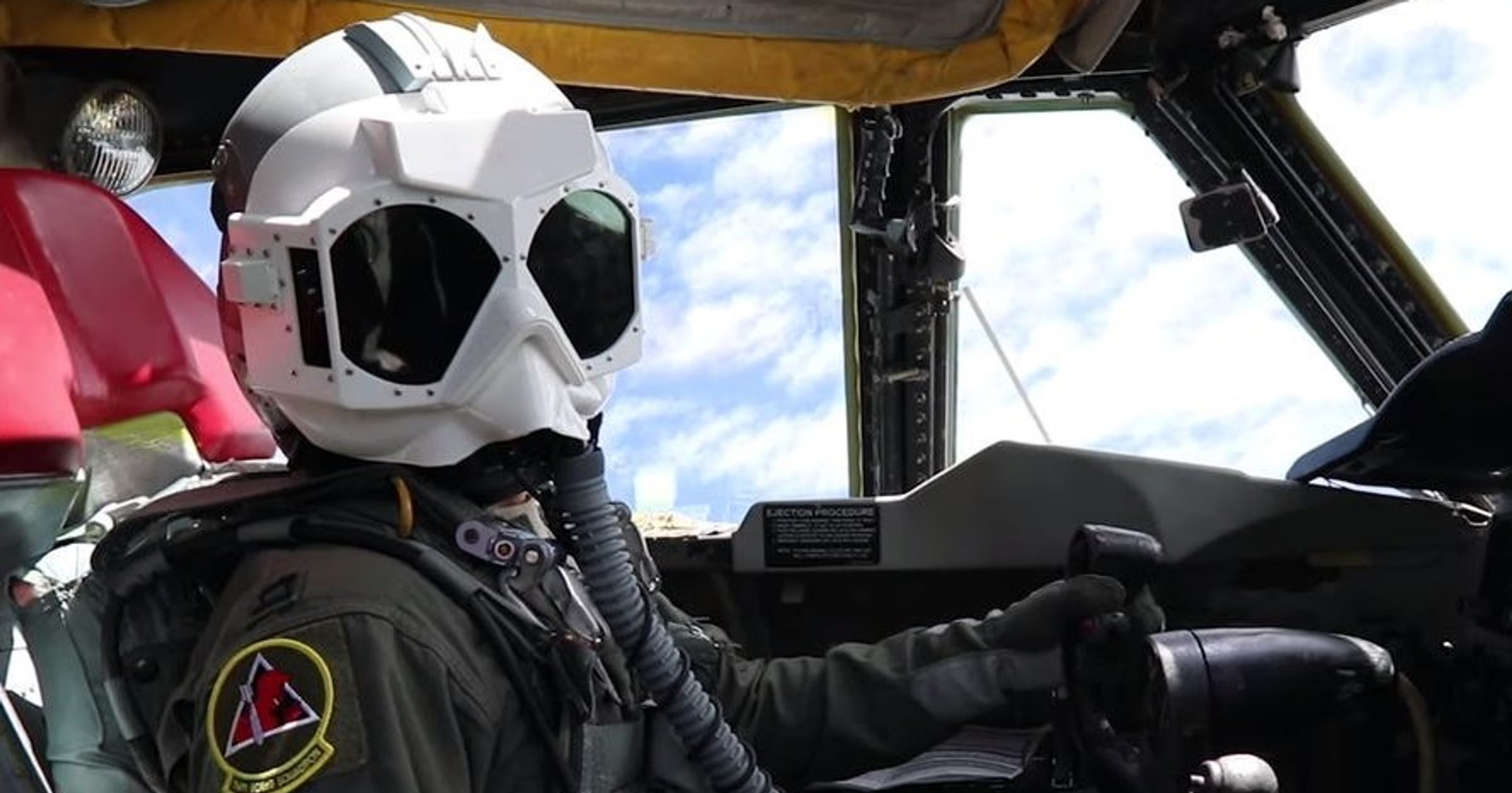 Stylized helmet artwork evoking the look of nuclear flash protective goggles.