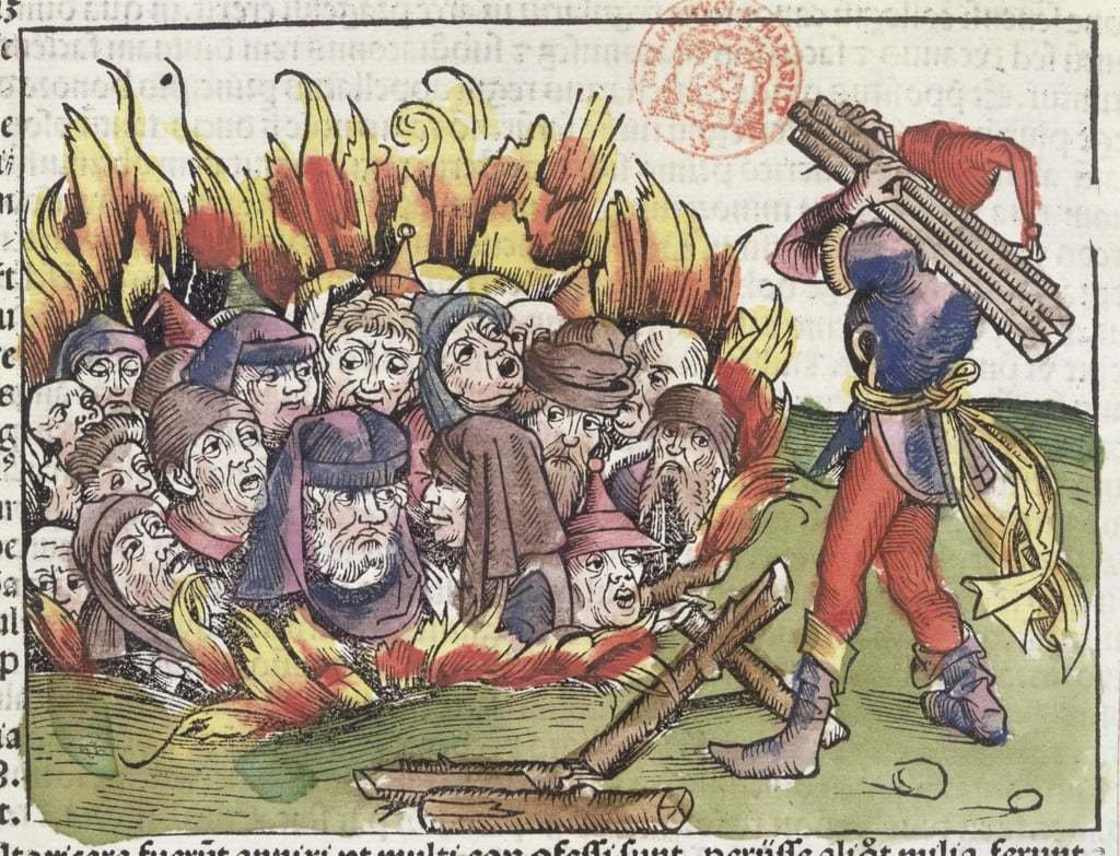 Period woodcut depicting a group execution by burning, illustrating the fate of those convicted in the 1697 Wołyń church-robbery case.